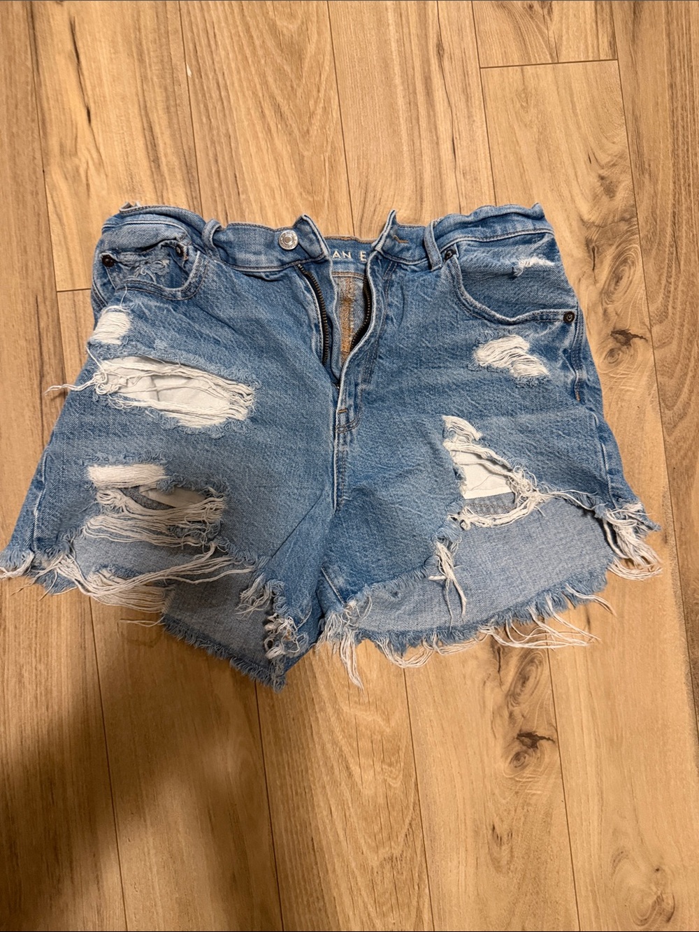 High-Rise Distressed Denim Shorts - Light Blue